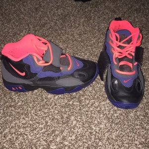 Neon orange, black and indigo Nikes